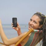 woman sitting on sun lounger