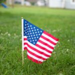 USA flag on green grass