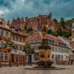 a fountain in the middle of a town square