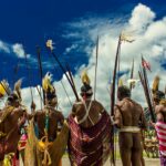 Men Wearing Tribal Costumes during Day