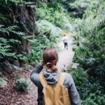 woman wearing yellow backpack