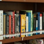 a book shelf filled with lots of books