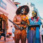 a couple of people that are standing in the street