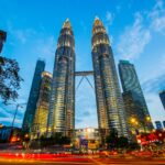 architectural photography of lighted city buildings