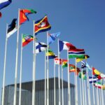 a bunch of flags that are flying in the air